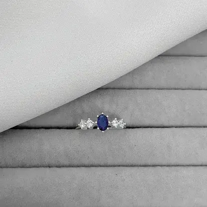 ANEL CINCO ZICÔNIAS MEIO OVAL AZUL