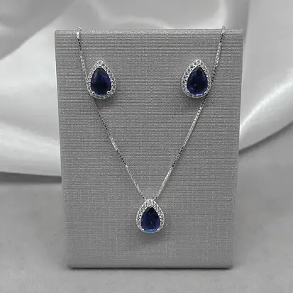 CONJUNTO GOTA ZIRCÔNIA AZUL DETALHE CRAV