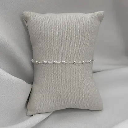 PULSEIRA BOLINHAS CRUZ
