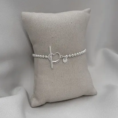 PULSEIRA BOLINHAS CORAÇAO VAZADO FECHO T