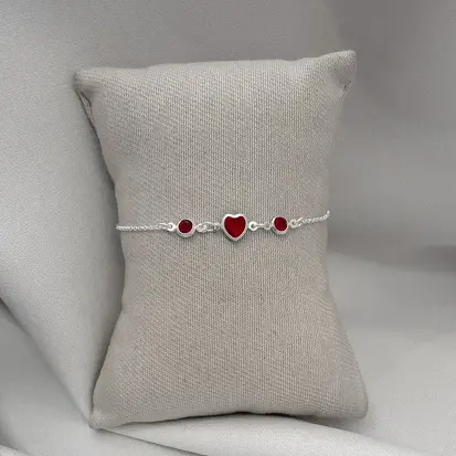 PULSEIRA MEIO CORAÇÃO 2 ZIRCONIAS LATERAL EMBUTIDO