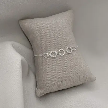 PULSEIRA 5 CÍRCULOS 2 CRAVEJADOS